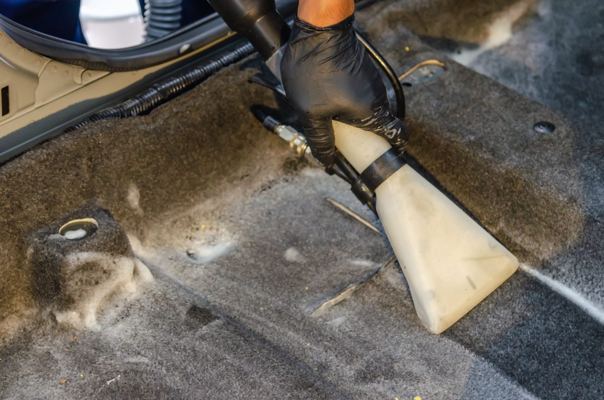 Deep cleaning carpet with an extraction tool - Good Taste Cleaning Services