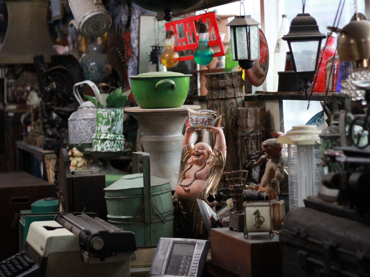 Severely cluttered room packed with items needing extreme cleaning - Good Taste Cleaning Services